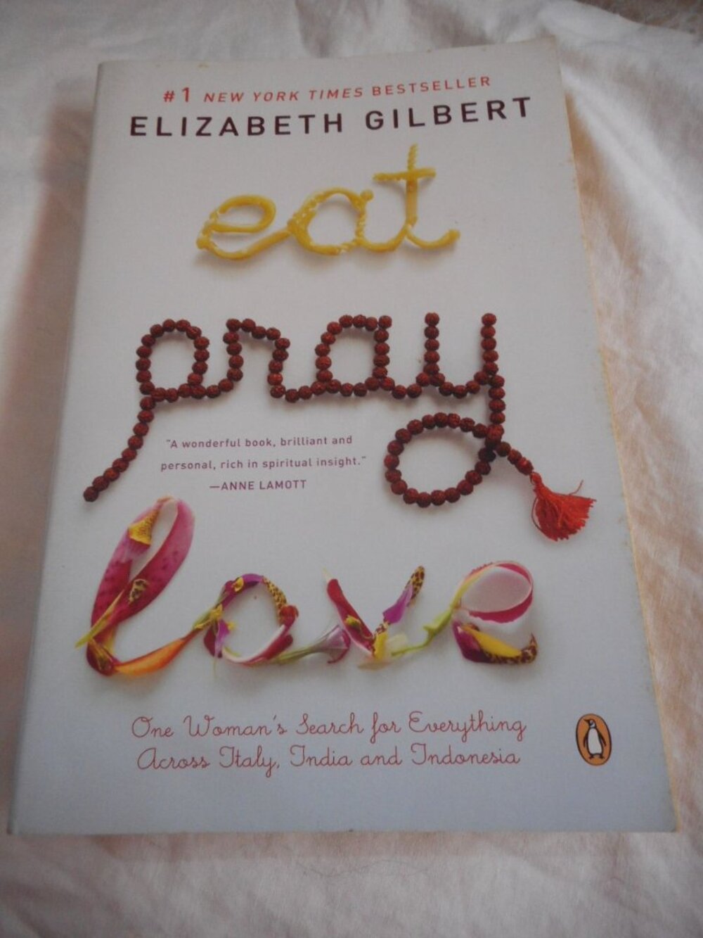 Paperback Eat Pray Love: One Woman's Search for Everything Across Italy, India a